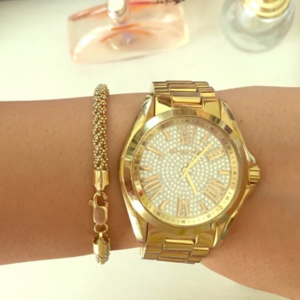 MK gold watch
